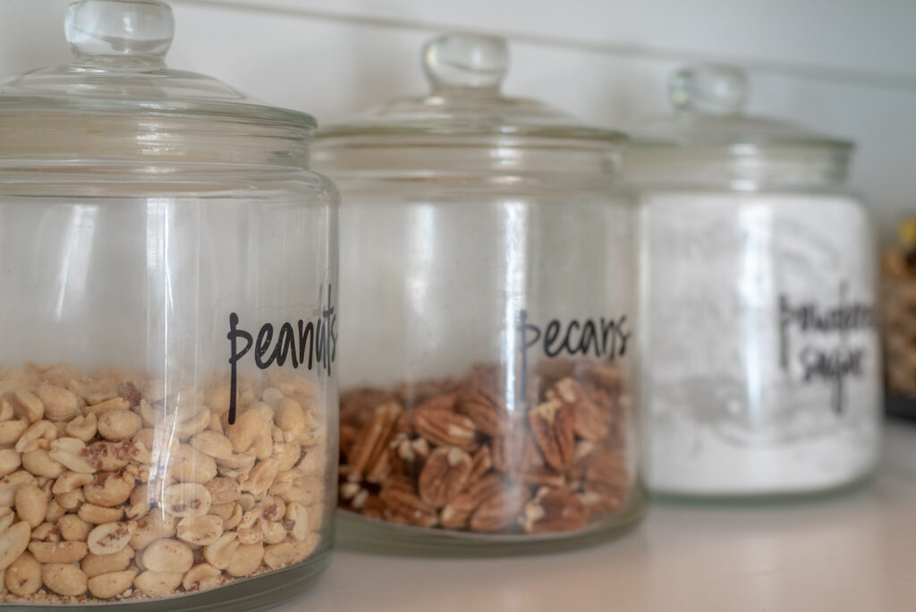 airtight glass canister jars make the pantry look like a beautiful store