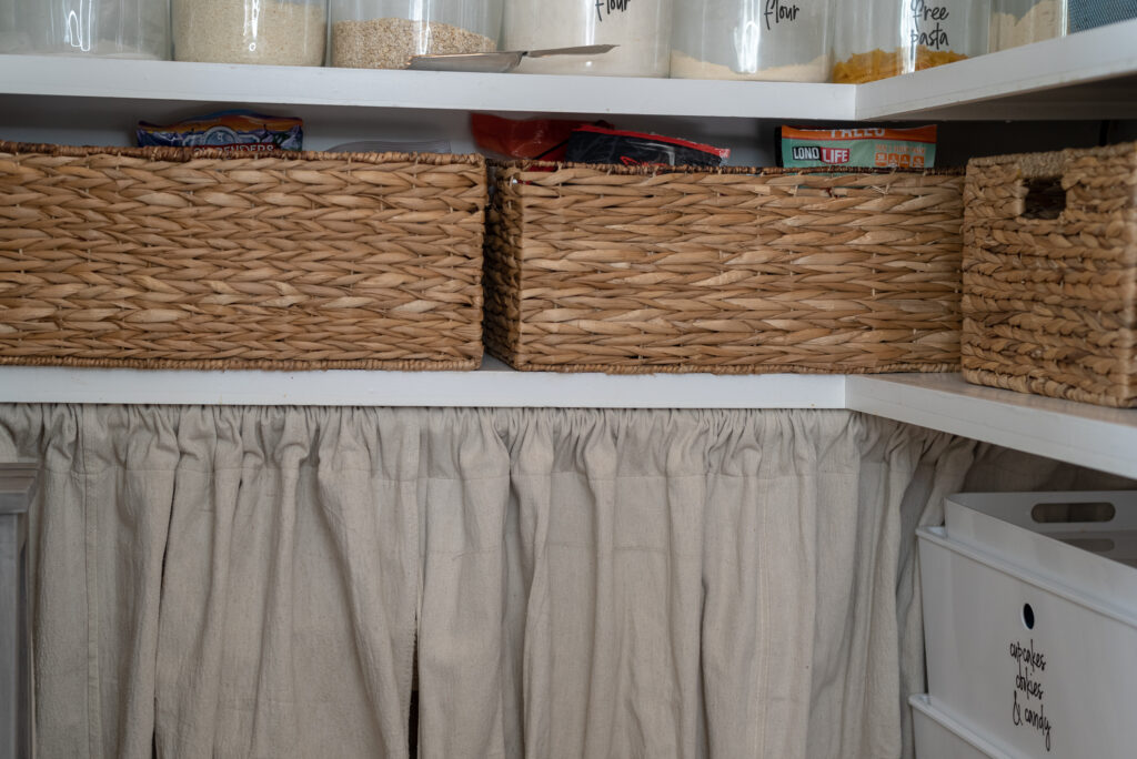 a skirt adds charm and hides clutter in a pantry