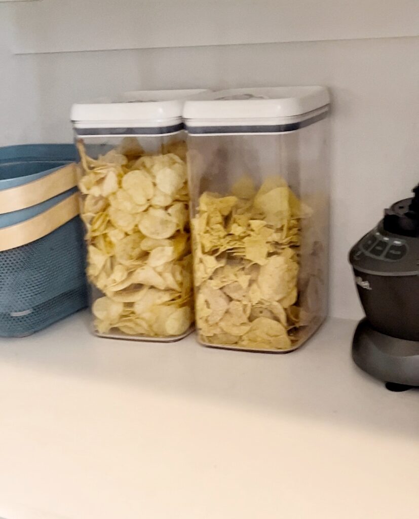 Clear airtight canisters keep food fresh and pantry organized.